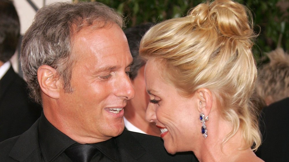 Actress Nicollette Sheridan (right) and singer Michael Bolton arrive to the 63rd Annual Golden Globe Awards