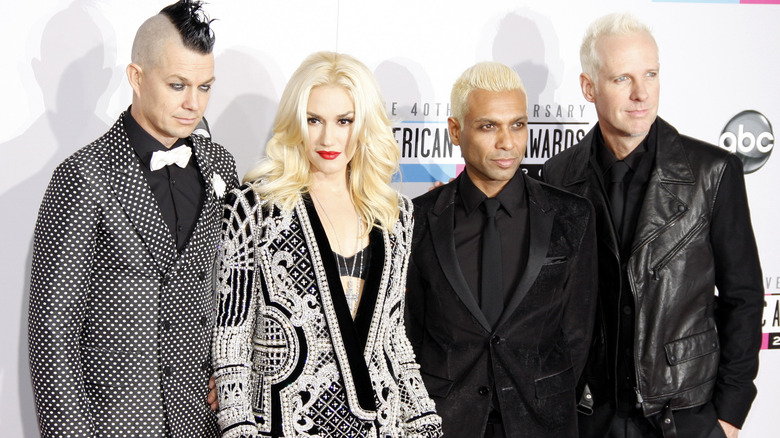 Gwen Stefani poses with her bandmates in 2012