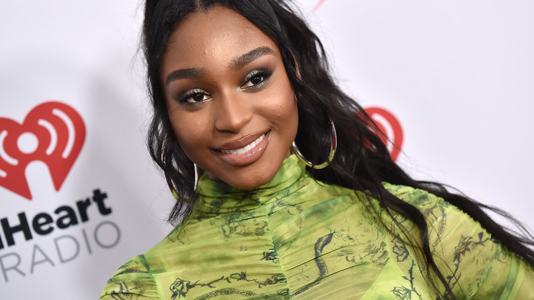 Normani smiling on the red carpet