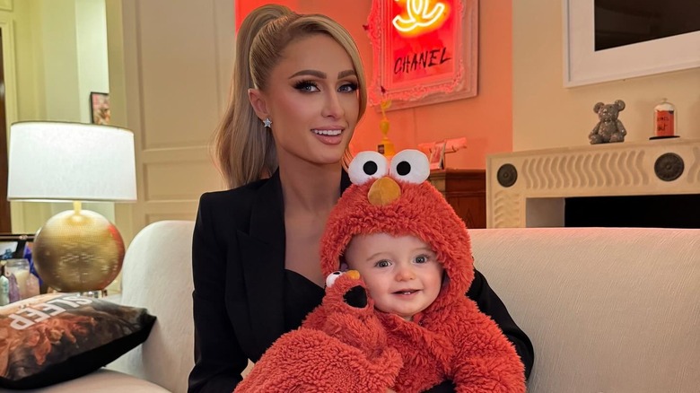 Paris Hilton with son Phoenix dressed as Elmo