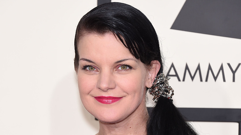 Pauley Perrette smiling at the 2015 Grammy Awards