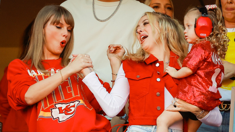 Taylor Swift, Brittany Mahomes shaking hands