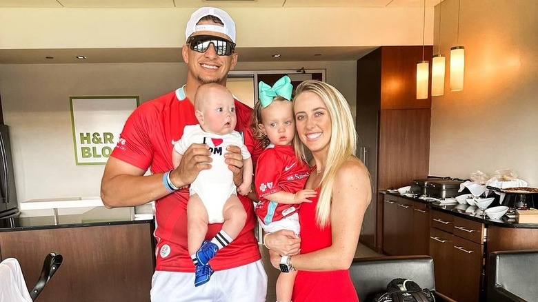 The Mahomes family posing