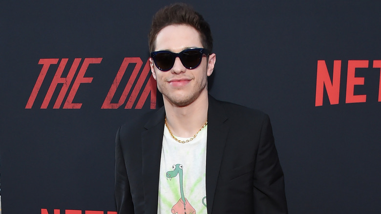 Pete Davidson wearing sunglasses on the red carpet