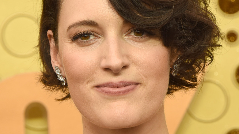 Phoebe Waller-Bridge smiling with lips closed