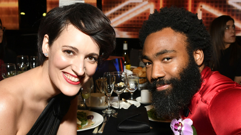 Phoebe Waller-Bridge and Donald Glover pose over dinner