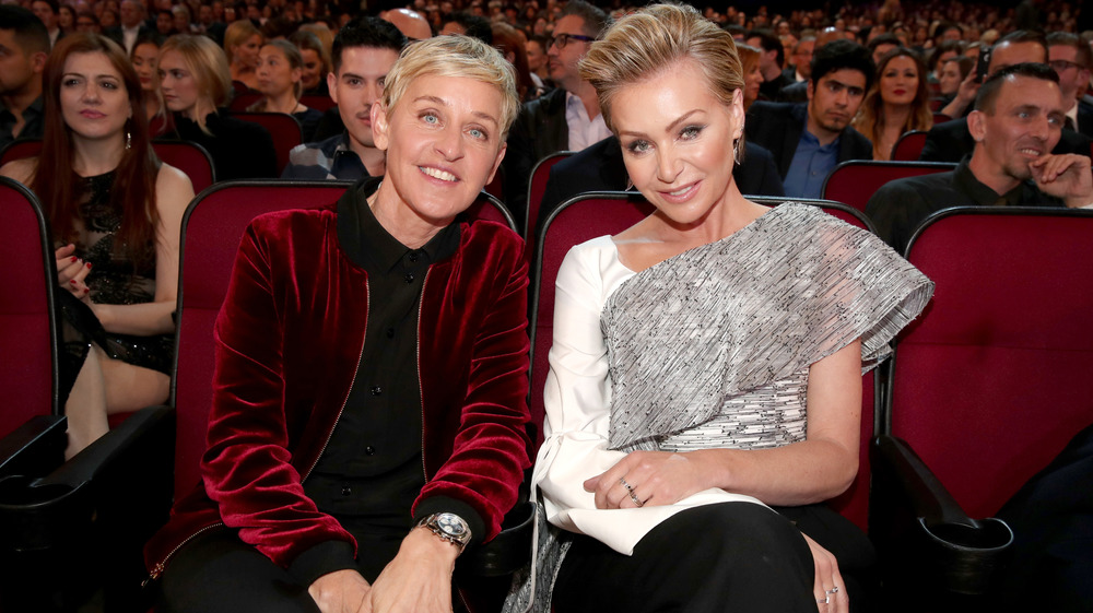 Ellen DeGeneres and Portia de Rossi posing for a photo together