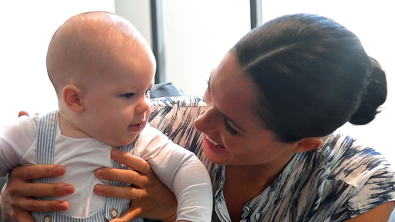 Meghan poses with Archie