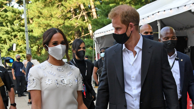 Prince Harry and Meghan Markle walking 