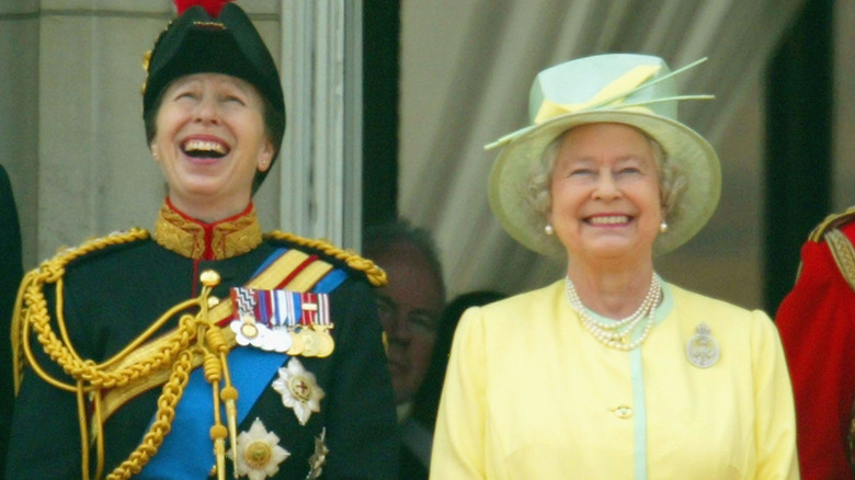 Princess Anne laughing alongside Queen Elizabeth
