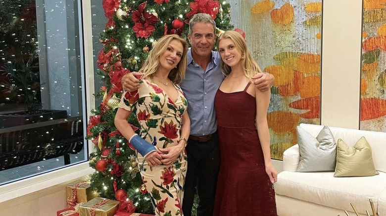 Ramona Singer, Mario Singer, and Avery Singer posing in front of Christmas tree