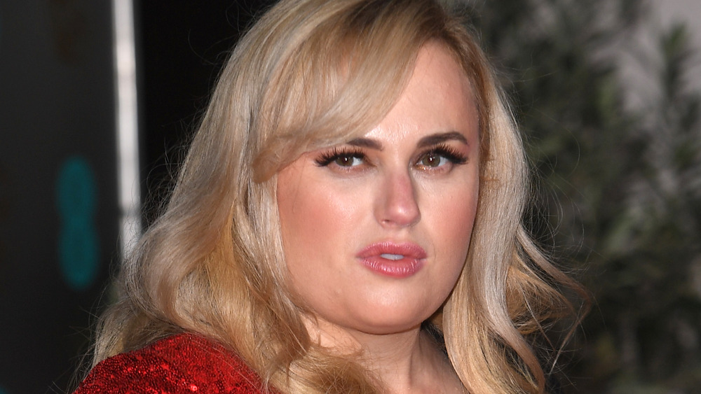 Rebel Wilson staring with a neutral expression