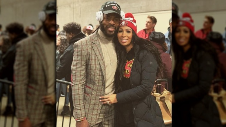 Richard Sherman and wife Ashley Moss pose for photo