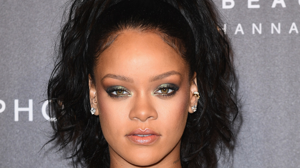 Rihanna staring with a serious expression