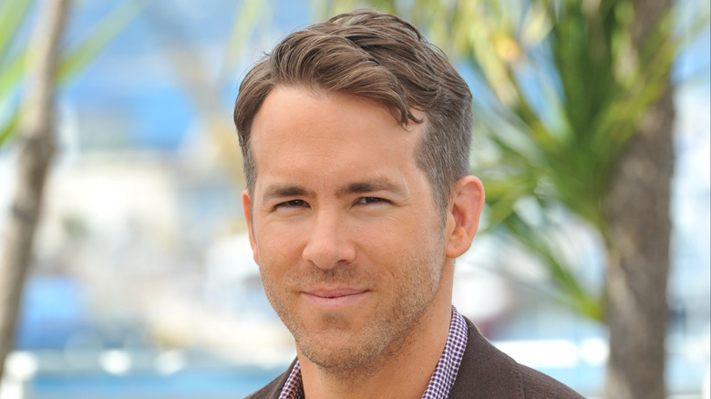 Ryan Reynolds slightly smiling