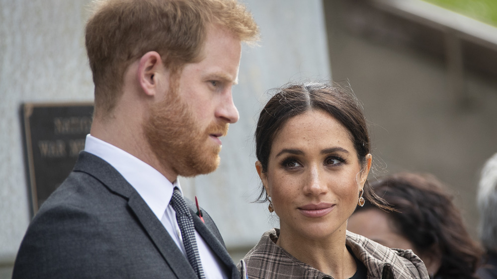 Meghan Markle looking at Prince Harry