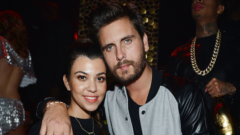 Kourtney Kardashian and Scott Disick smiling