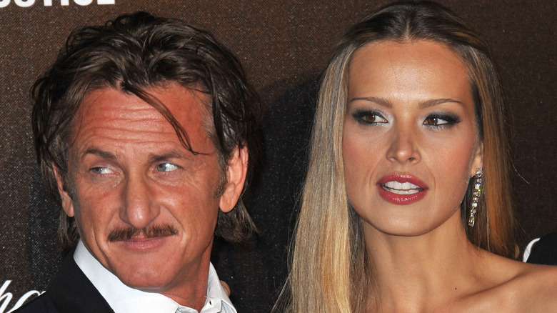 Sean Penn and Petra Nemcova at an event 