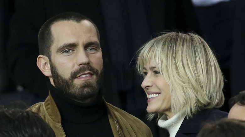 Robin Wright and husband Clement Giraudet at an event 