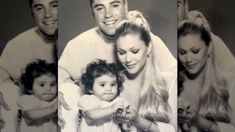 Shanna Moakler posing with her daughter and Oscar De La Hoya