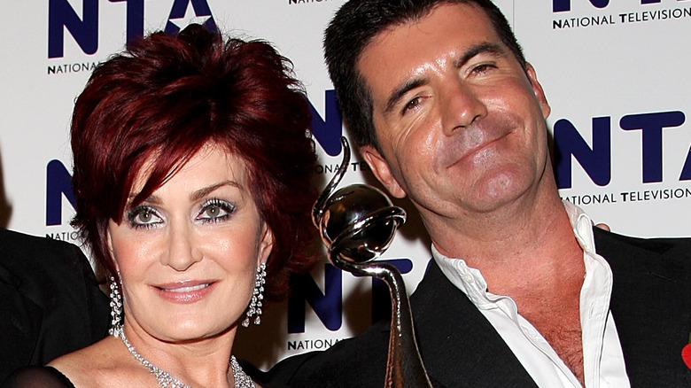 Sharon Osbourne and Simon Cowell in better times