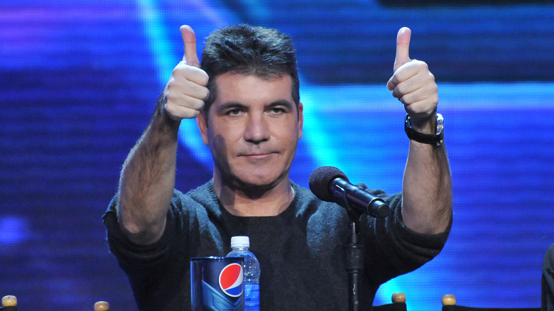 Simon Cowell thumbs up