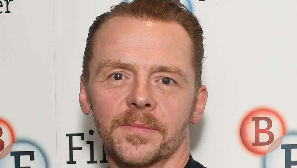 Simon Pegg with a serious expression