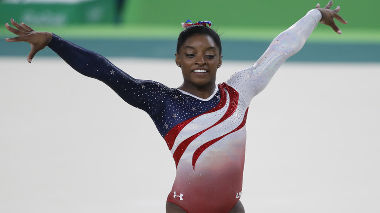 Simone Biles performing at the Olympics