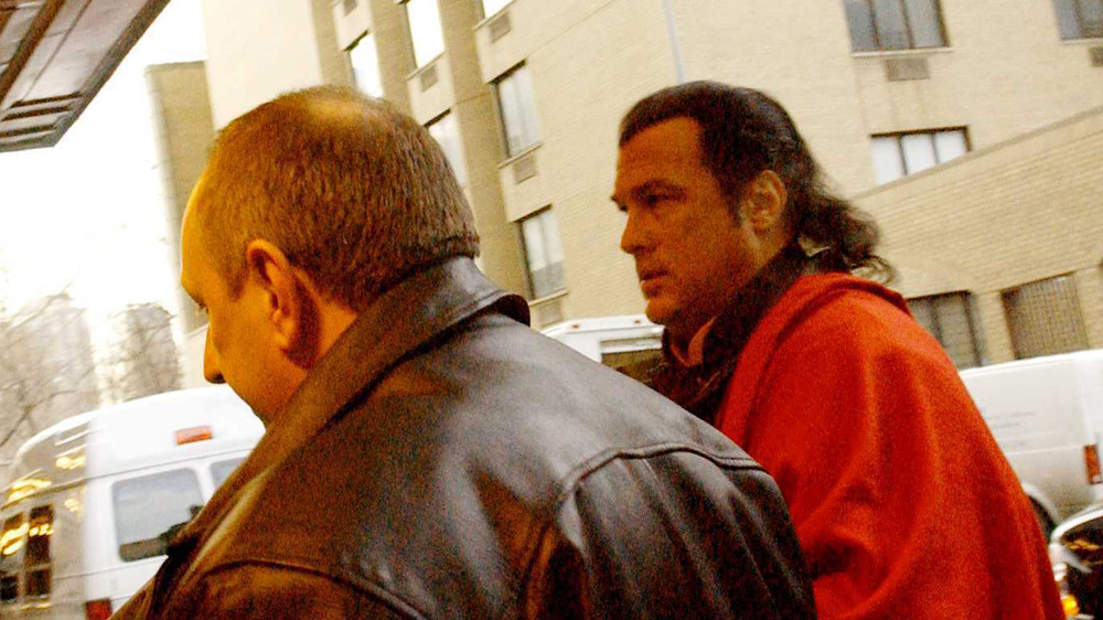 Steven Seagal attends extortion trial 