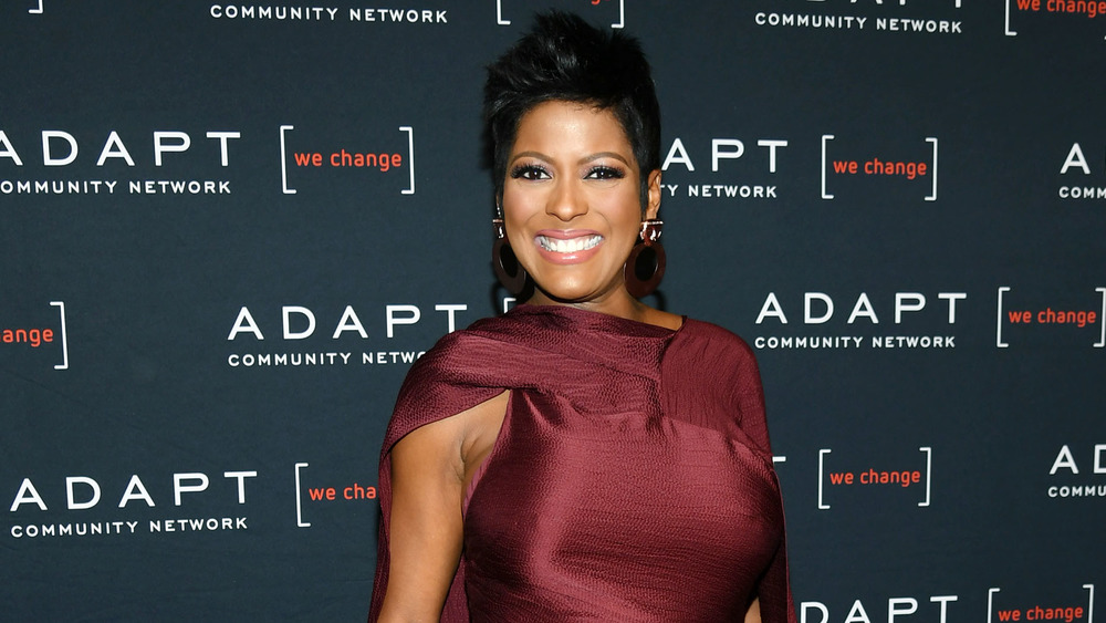 Tamron Hall smiling at an event