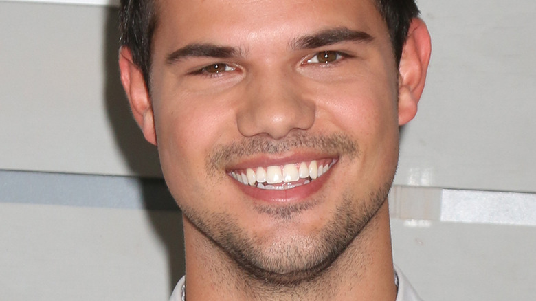 Taylor Lautner smiing