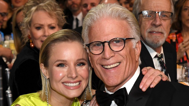 Ted Danson posing with Kristen Bell