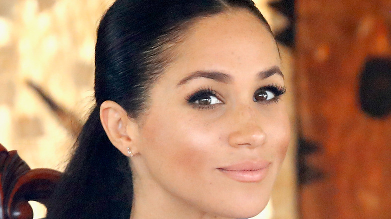 Meghan, Duchess of Sussex posing for photo at Tupou College on October 26, 2018 in Nuku'alofa, Tonga