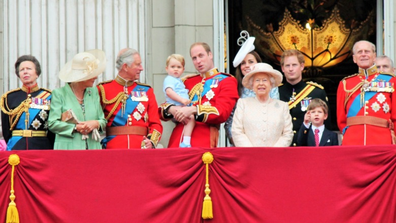 The royal family wearing military uniforms