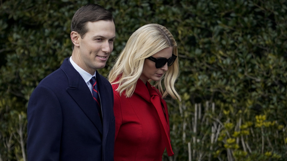 Ivanka Trump and Jared Kushner walk on the south lawn of the White House in 2020