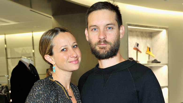 Tobey Maguire and Jennifer Meyer posing