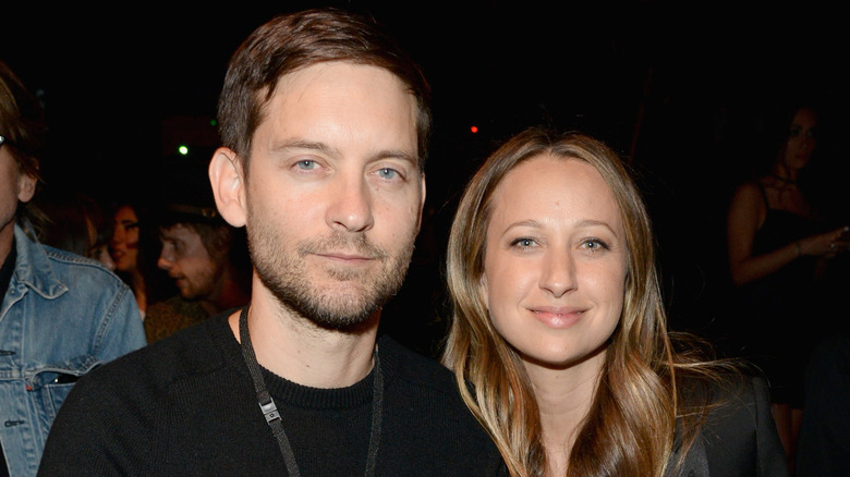 Tobey Maguire and Jennifer Meyer posing