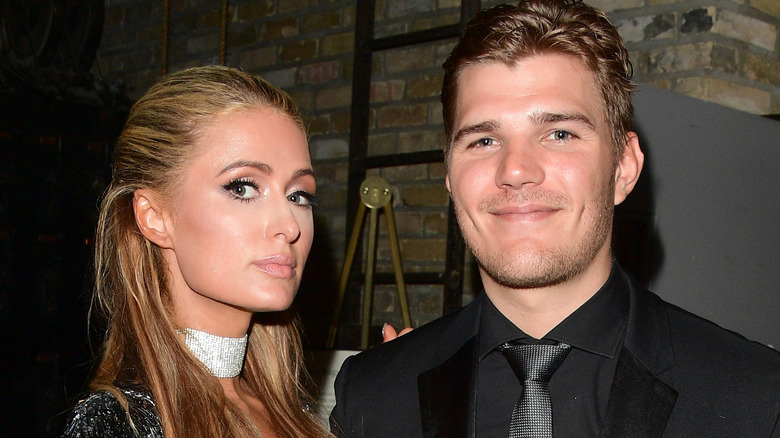 Paris Hilton and Chris Zylka posing together