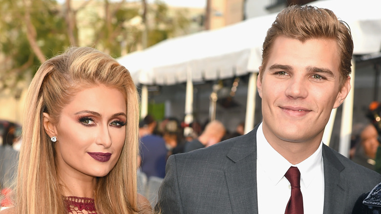 Paris Hilton and Chris Zylka posing together