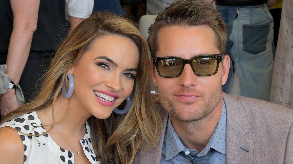Chrishell Stause, Justin Hartley smiling at a polo match