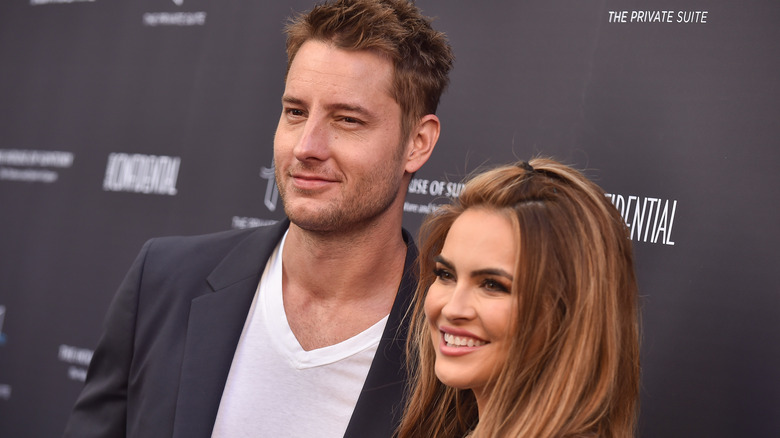 Justin Hartley and Chrishell Stause smiling