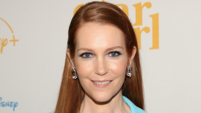 Darby Stanchfield smiling on the red carpet