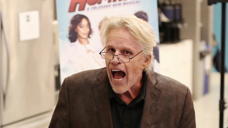 Gary Busey brown jacket