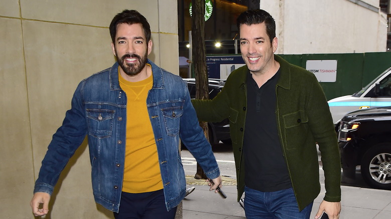 The Property Brothers walking down street