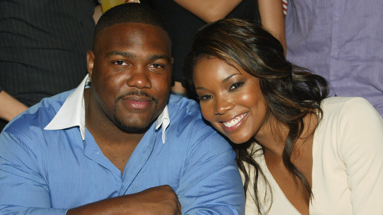 Chris Howard and Gabrielle Union smiling