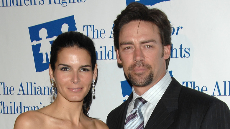 Angie Harmon and Jason Sehorn smiling