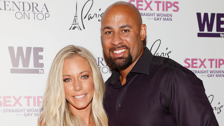 Kendra Wilkinson and Hank Baskett smiling