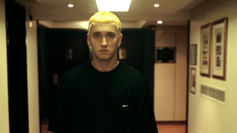 Eminem posing in hallway