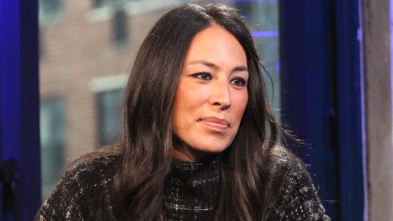 Joanna Gaines wearing plaid sweater