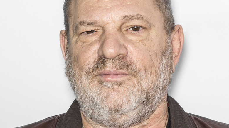 Harvey Weinstein posing for cameras